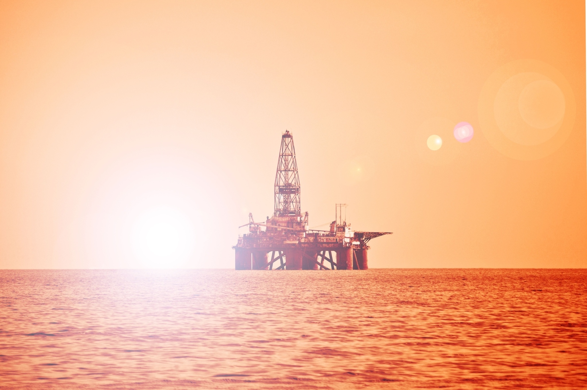 Offshore rig at sunset